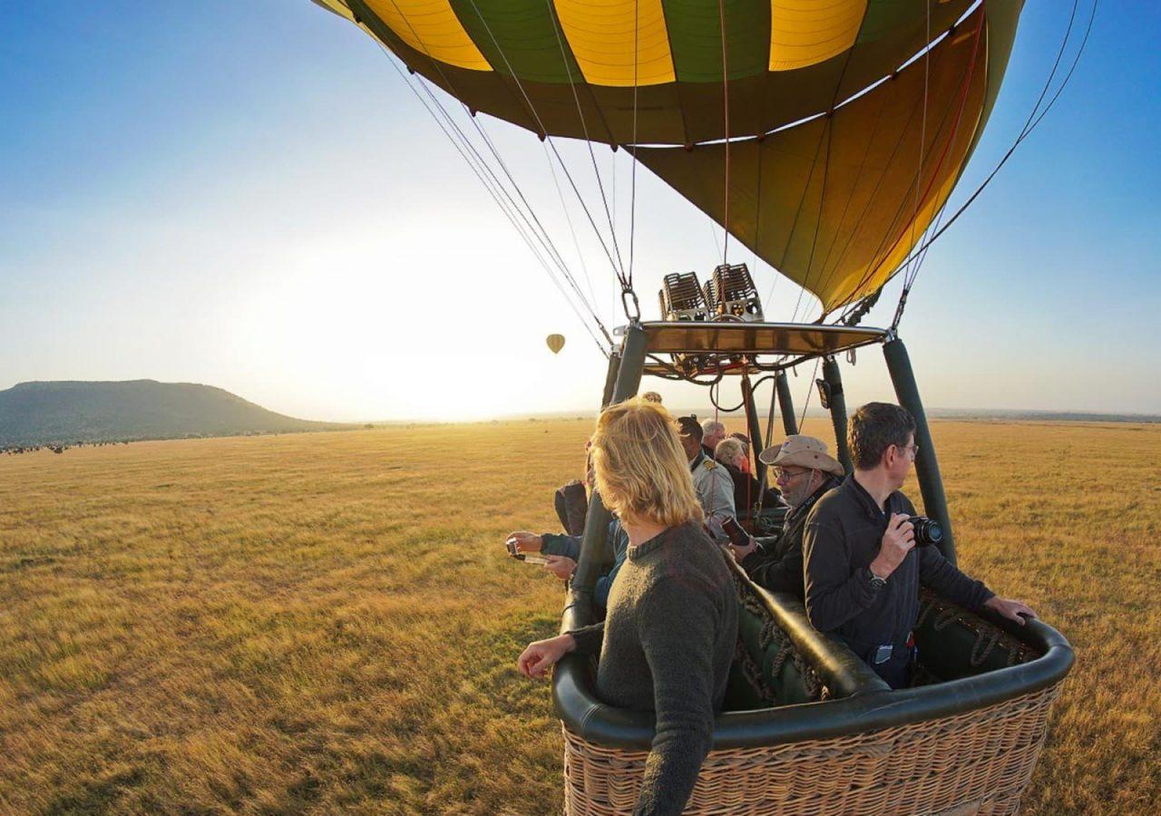 Luxury Safari Planning: What Client Feedback Teaches Us About Better Safari Experiences 18 The view from inside a hot air balloon basket at sunrise