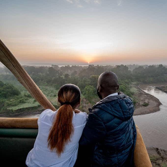 Luxury Safari Planning: What Client Feedback Teaches Us About Better Safari Experiences 16 Guests watching the sunrise from a hot air balloon