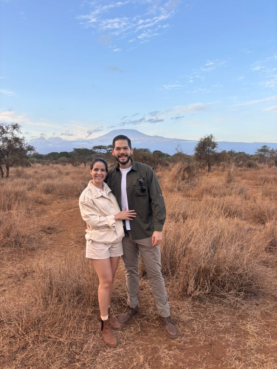 Luxury Safari Planning: What Client Feedback Teaches Us About Better Safari Experiences 8 CampTrek Safaris guests with Mount Kilimanjaro in the background