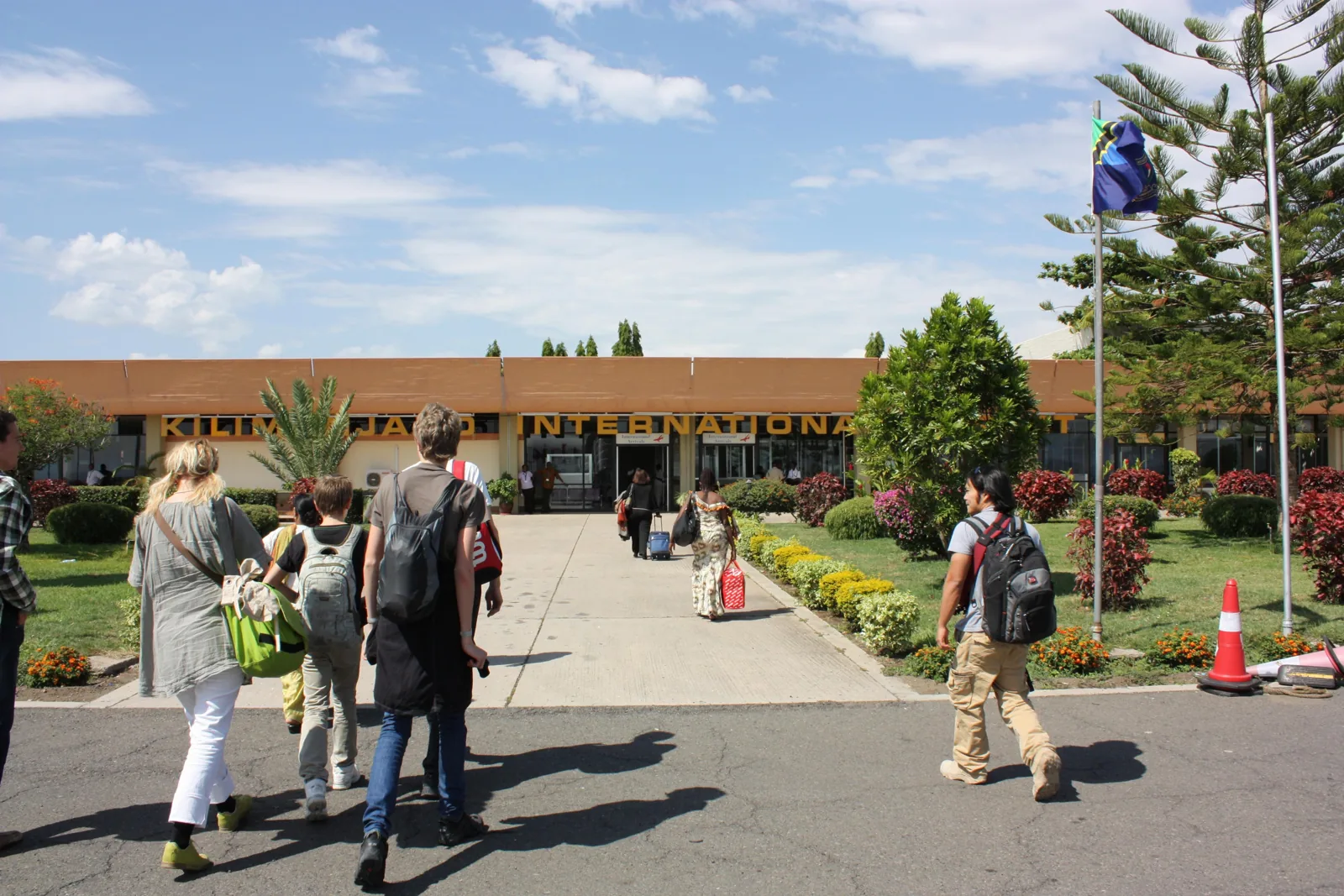 Travellers walking to international arrivals at Kilimanjaro International Airport, Tanzania