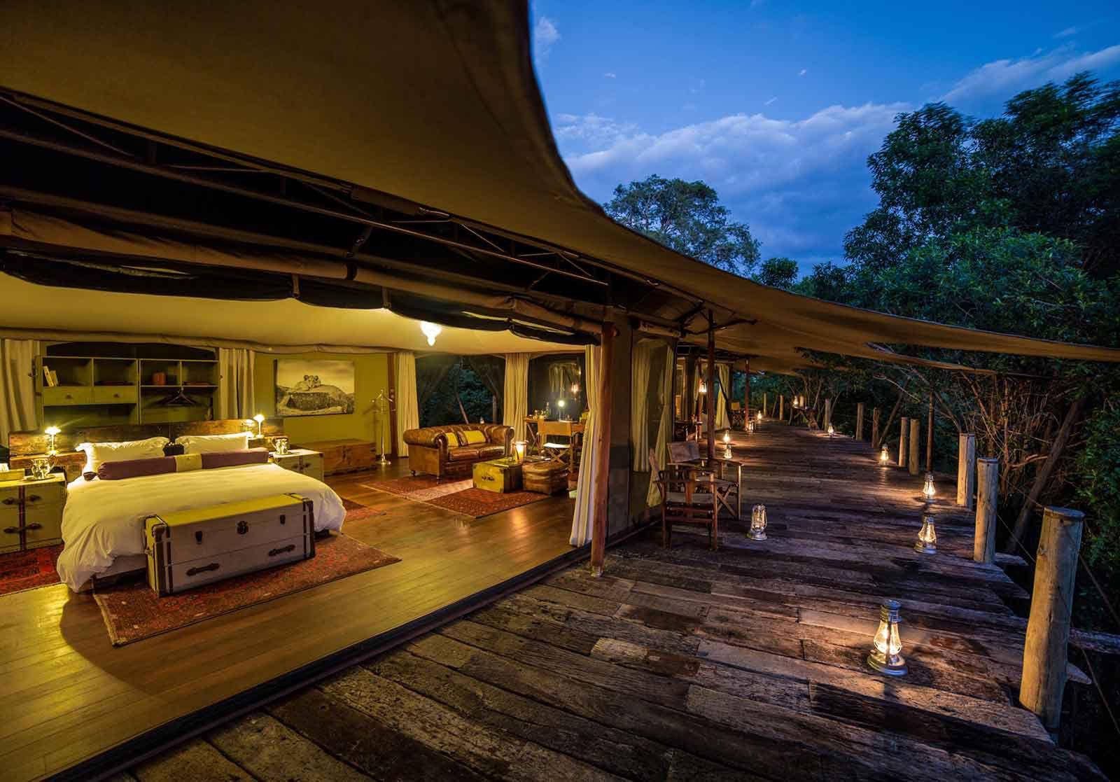 Luxury Safari Planning: What Client Feedback Teaches Us About Better Safari Experiences 11 A luxury tent interior with a copper bathtub